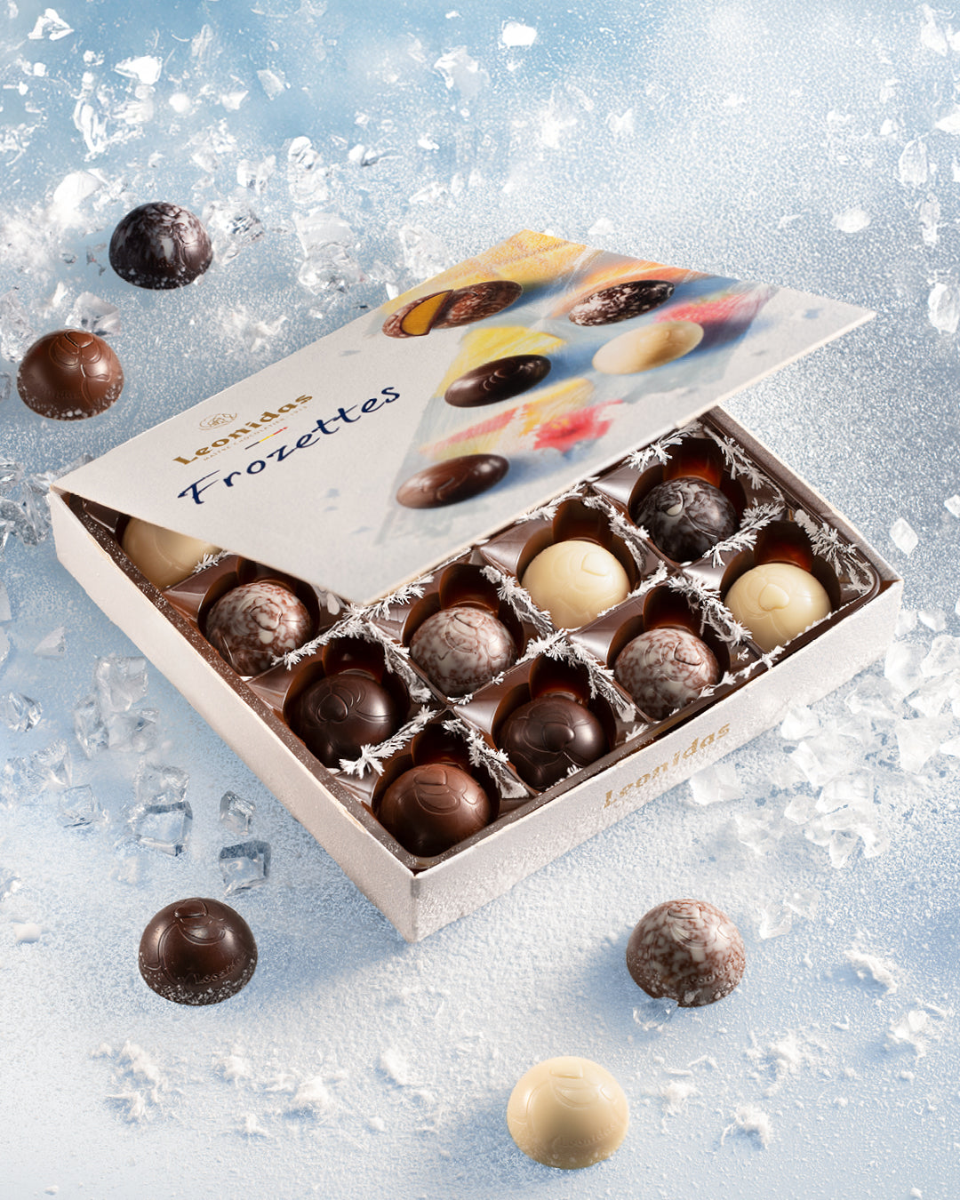 Box of Frozettes chocolates on a snowy background