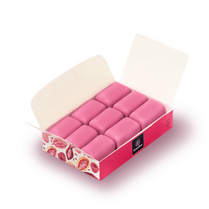 Gift box which contains Manon Ruby chocolates with raspberry buttercream, a thin layer of praline and small pieces of raspberries.