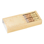 A beautiful gold bar gift box filled with our Gianduja collection: the Gianduja with finely ground nuts, the Giantina with pieces of feuilletine (biscuit), and the Giamanda with pieces of almond.